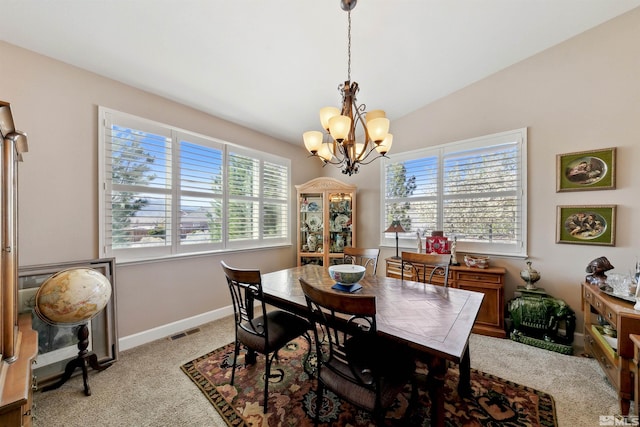 1367 Porter Dr, Minden, NV 89423 - dining space featuring a chandelier, light carpet, vaulted ceiling, and baseboards