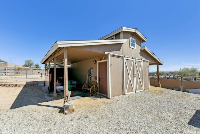 1367 Porter Dr, Minden, NV 89423 - view of outbuilding featuring an outdoor structure and an exterior structure