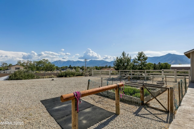 1367 Porter Dr, Minden, NV 89423 - view of yard with a mountain view, a garden, and a rural view