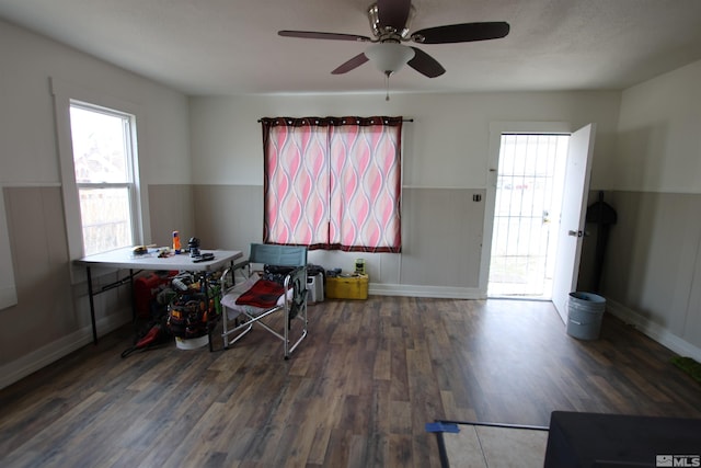 665 C St, Hawthorne, NV 89415 - misc room featuring a wainscoted wall, wood finished floors, ceiling fan, and baseboards