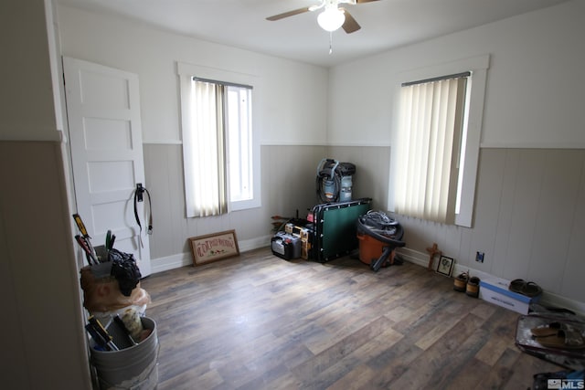 665 C St, Hawthorne, NV 89415 - miscellaneous room featuring ceiling fan, wood finished floors, and wainscoting