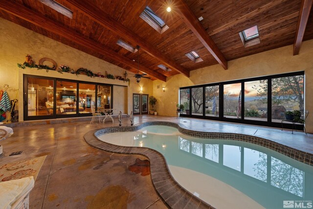 951 Riverview Dr, Gardnerville, NV 89460 - indoor pool with a skylight and a hot tub