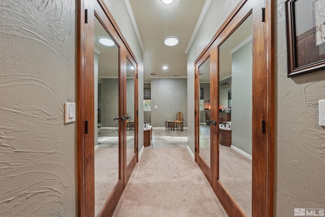 951 Riverview Dr, Gardnerville, NV 89460 - hall featuring french doors, a textured wall, recessed lighting, carpet, and crown molding