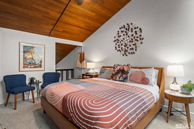 bedroom with wooden ceiling, vaulted ceiling, carpet, and baseboards