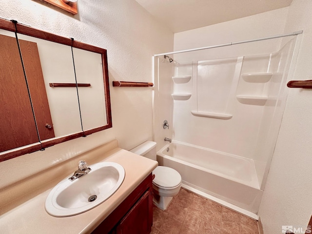4985 W 7th St Unit 11, Reno, NV 89503 - bathroom featuring toilet, vanity, shower / bath combination, and tile patterned flooring