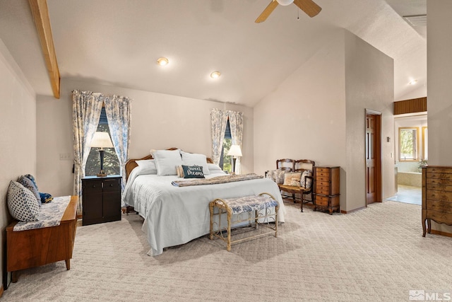 4300 Wild Eagle Ter, Reno, NV 89511 - bedroom with lofted ceiling, light carpet, connected bathroom, ceiling fan, and baseboards
