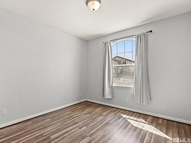 7730 Opal Blf, Reno, NV 89506 - spare room featuring wood finished floors and baseboards
