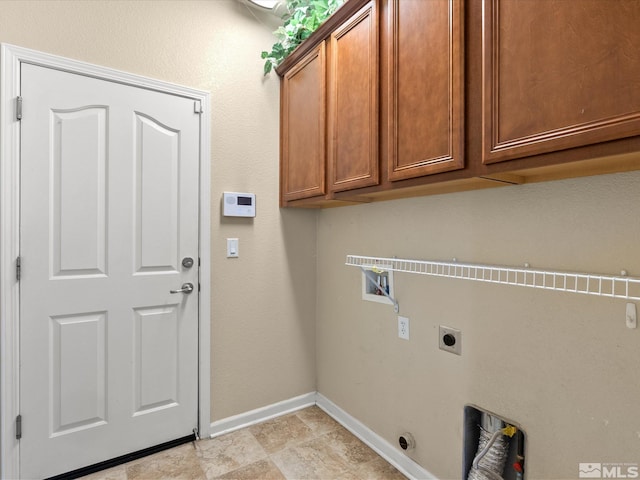 7730 Opal Blf, Reno, NV 89506 - laundry room featuring electric dryer hookup, cabinet space, baseboards, and hookup for a washing machine