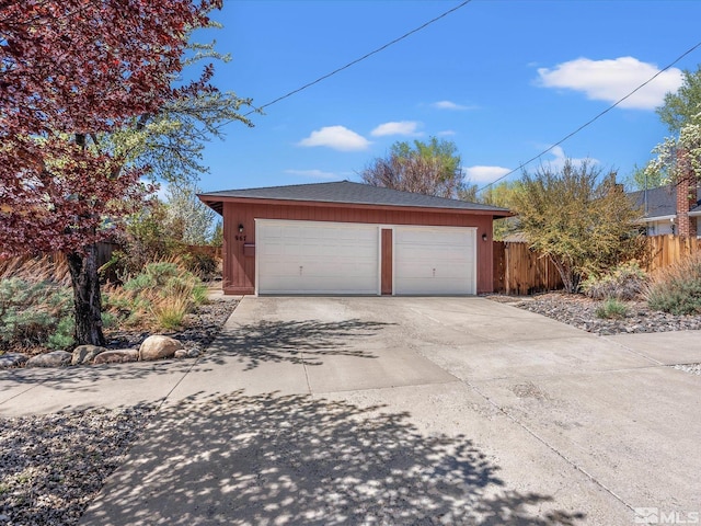 detached garage with fence