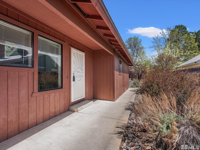 entrance to property with a patio area