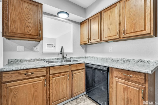 6735 Peppermint Dr, Reno, NV 89506 - kitchen with dishwasher, a sink, and brown cabinetry