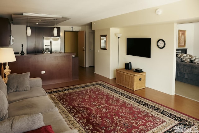 255 N Sierra St Unit 708, Reno, NV 89501 - living area featuring dark wood-type flooring and baseboards