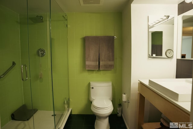 255 N Sierra St Unit 708, Reno, NV 89501 - full bathroom featuring a shower stall, tile patterned floors, and vanity