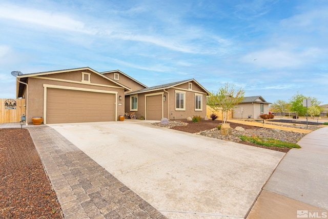 1180 Ferretto Pkwy, Dayton, NV 89403 - ranch-style house with stucco siding, concrete driveway, and an attached garage