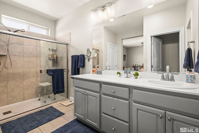 1180 Ferretto Pkwy, Dayton, NV 89403 - bathroom with a shower stall, double vanity, and tile patterned flooring