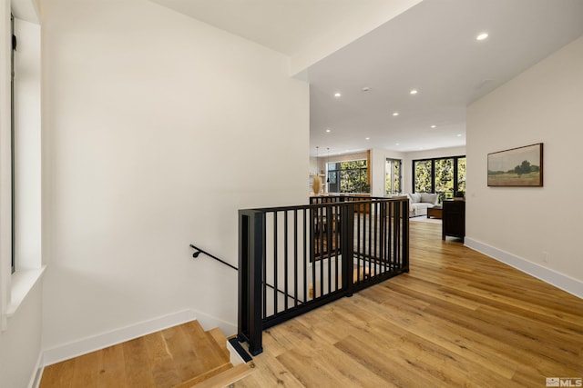2531 Edgerock Rd, Reno, NV 89519 - stairs with recessed lighting, wood finished floors, and baseboards