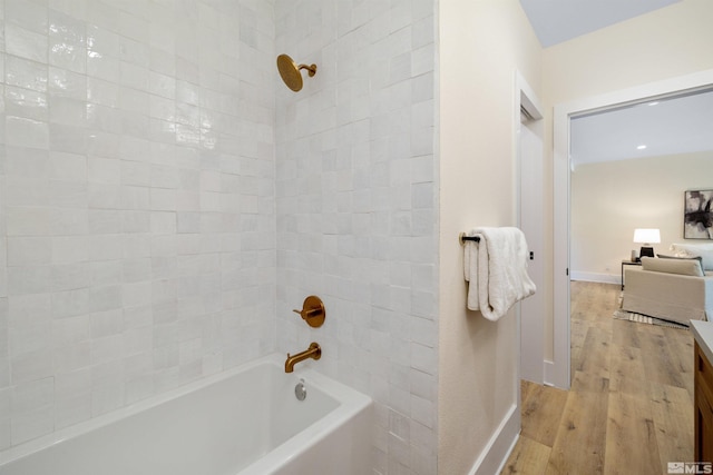 2531 Edgerock Rd, Reno, NV 89519 - full bath with wood finished floors, shower / bath combination, vanity, and baseboards