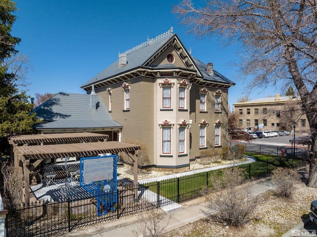 102 N Curry St, Carson City, NV 89703 - view of front of home with a chimney