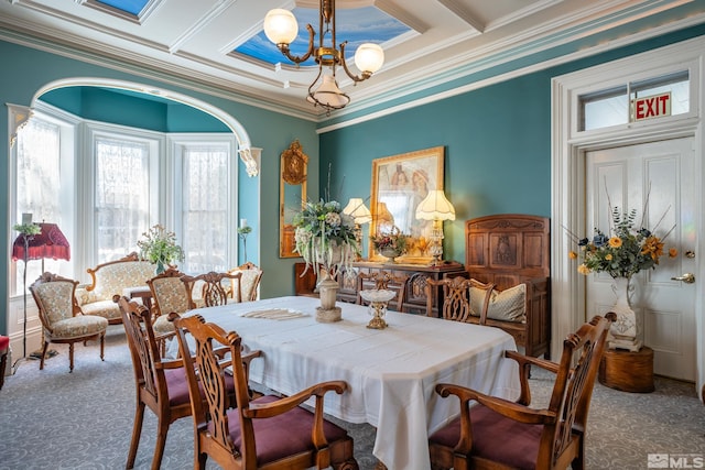 102 N Curry St, Carson City, NV 89703 - carpeted dining area with a chandelier, coffered ceiling, ornamental molding, and beamed ceiling