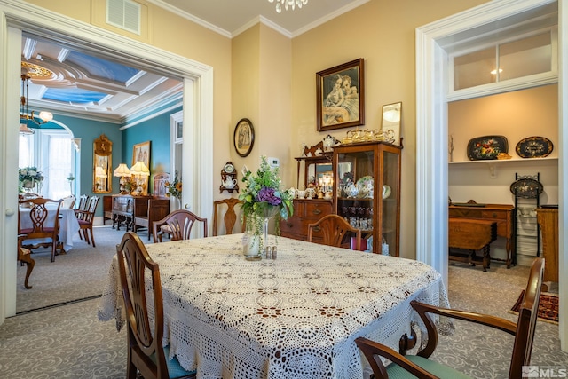 102 N Curry St, Carson City, NV 89703 - dining room featuring crown molding, carpet, and a chandelier