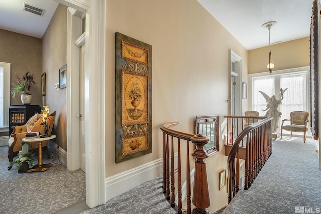 102 N Curry St, Carson City, NV 89703 - hall with carpet, an upstairs landing, and baseboards