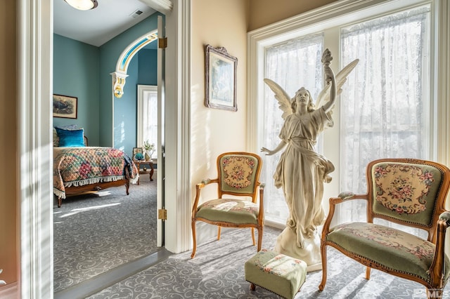 102 N Curry St, Carson City, NV 89703 - sitting room with carpet and arched walkways