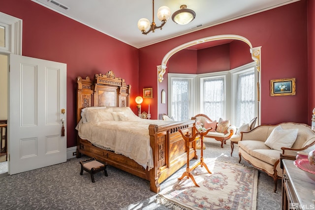 102 N Curry St, Carson City, NV 89703 - bedroom featuring carpet flooring, a chandelier, and crown molding