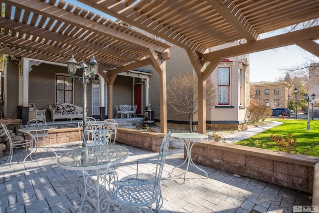 102 N Curry St, Carson City, NV 89703 - view of patio featuring a pergola and outdoor dining space