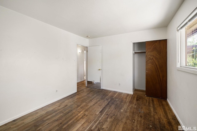 3301 Everett Dr, Reno, NV 89503 - unfurnished bedroom with wood finished floors, baseboards, and a closet