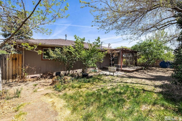 3301 Everett Dr, Reno, NV 89503 - view of yard featuring fence and a wooden deck