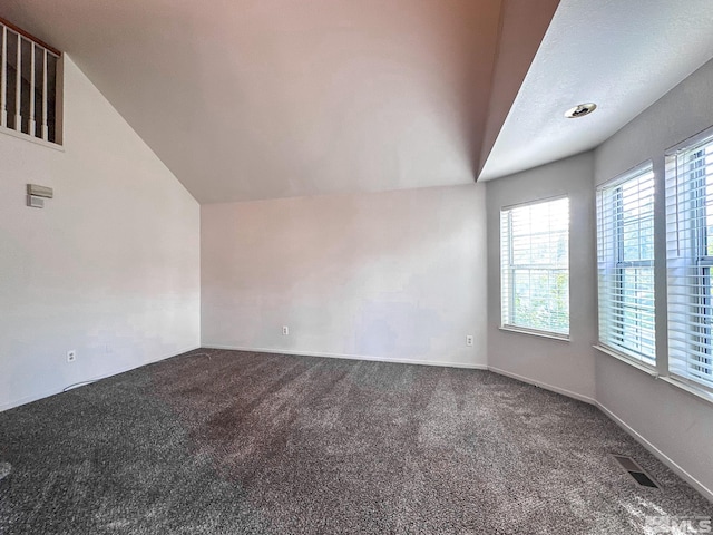 2621 Fanto Ct, Sparks, NV 89431 - unfurnished room with lofted ceiling and carpet flooring
