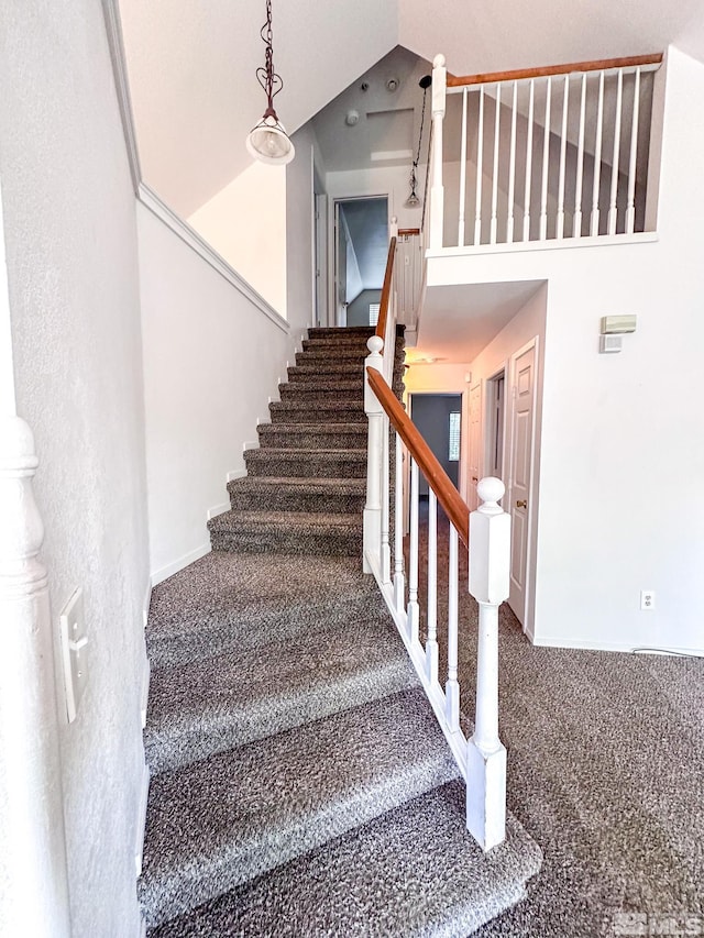 2621 Fanto Ct, Sparks, NV 89431 - stairs featuring carpet flooring and lofted ceiling