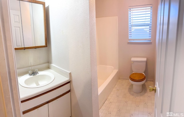 2621 Fanto Ct, Sparks, NV 89431 - bathroom featuring toilet, vanity, a bath, and a shower