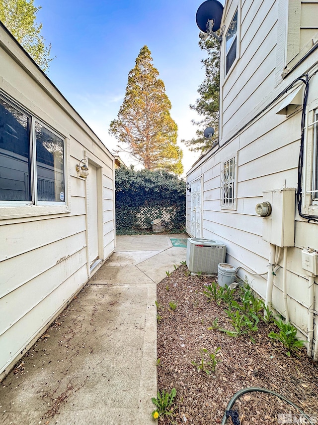 2621 Fanto Ct, Sparks, NV 89431 - view of home's exterior with central AC and a patio
