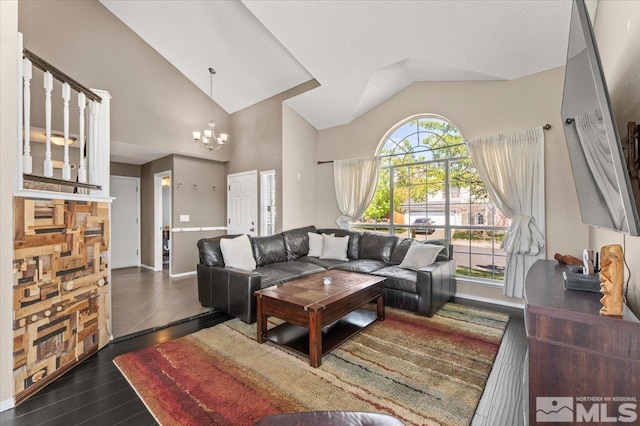 4776 Scenic Hill Cir, Reno, NV 89523 - living room with wood finished floors, a chandelier, baseboards, and high vaulted ceiling