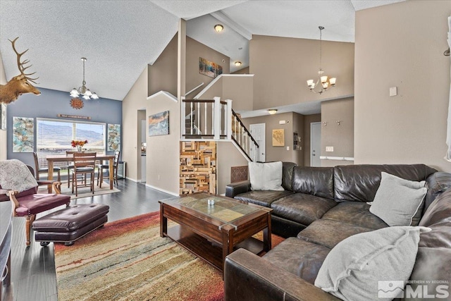 4776 Scenic Hill Cir, Reno, NV 89523 - living area featuring a chandelier, stairway, wood finished floors, high vaulted ceiling, and baseboards