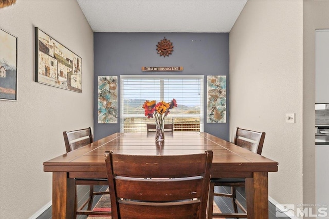 4776 Scenic Hill Cir, Reno, NV 89523 - dining room featuring baseboards and a textured wall