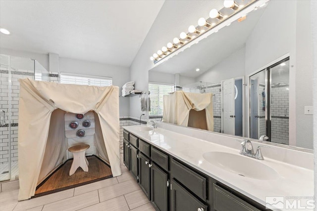 4776 Scenic Hill Cir, Reno, NV 89523 - bathroom with vaulted ceiling, a shower stall, and double vanity