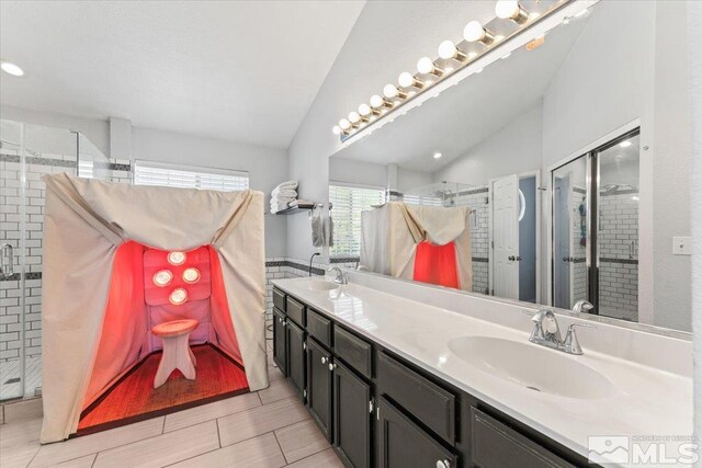4776 Scenic Hill Cir, Reno, NV 89523 - full bathroom with vaulted ceiling, a stall shower, and double vanity