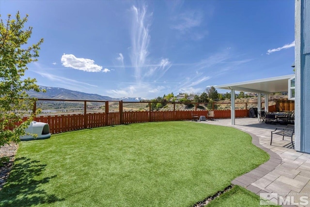 4776 Scenic Hill Cir, Reno, NV 89523 - view of yard with a mountain view and a patio