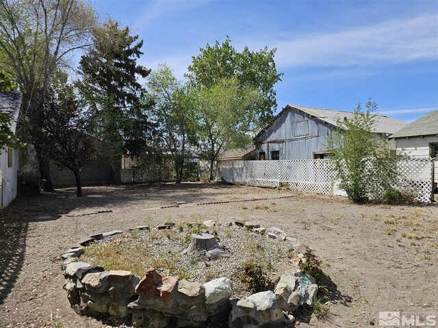 311 S Main St, Yerington, NV 89447 - view of yard featuring fence