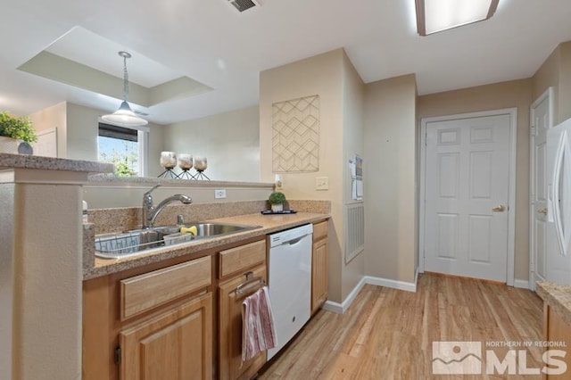 900 S Meadows Pkwy Unit 614, Reno, NV 89521 - kitchen featuring dishwasher, a sink, light wood-style flooring, baseboards, and light countertops