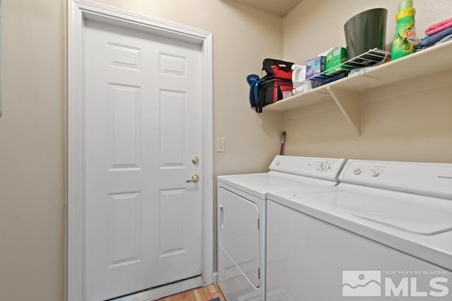 900 S Meadows Pkwy Unit 614, Reno, NV 89521 - laundry room with washer and dryer and light wood-style flooring