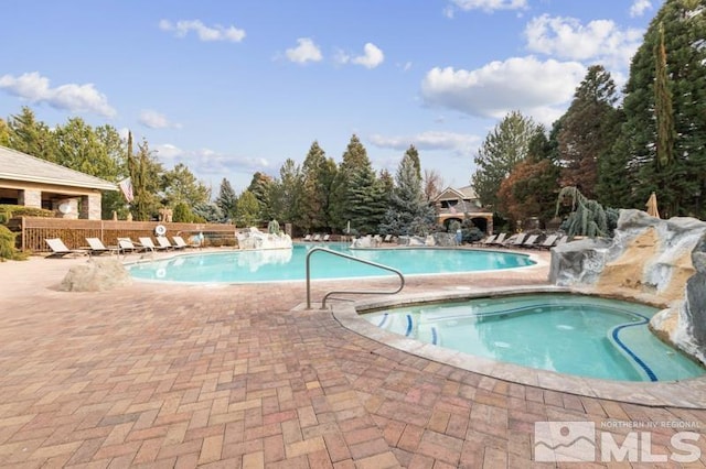 900 S Meadows Pkwy Unit 614, Reno, NV 89521 - community pool with a patio