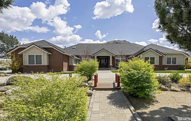2057 W Washington St, Carson City, NV 89703 - ranch-style house with brick siding