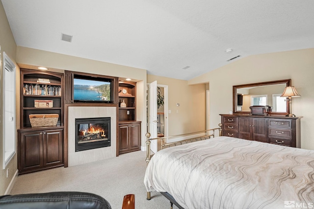 14245 Prairie Flower Ct, Reno, NV 89511 - carpeted bedroom with lofted ceiling and a fireplace