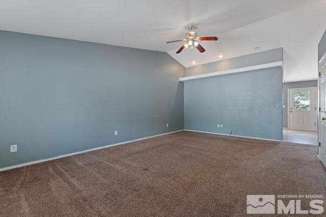 95 Hunter Park Way, Fallon, NV 89406 - carpeted spare room with a ceiling fan, vaulted ceiling, and baseboards