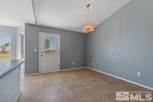 95 Hunter Park Way, Fallon, NV 89406 - foyer featuring plenty of natural light, a chandelier, and baseboards