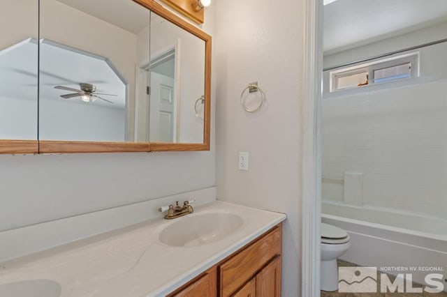 95 Hunter Park Way, Fallon, NV 89406 - bathroom featuring double vanity, toilet, and ceiling fan