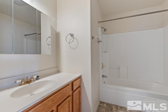 95 Hunter Park Way, Fallon, NV 89406 - bathroom with shower / bath combination, vanity, and baseboards